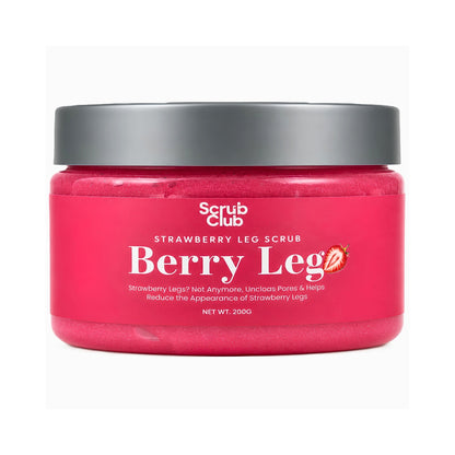 A jar of Scrub Club Berry Leg Strawberry Leg Scrub, featuring a vibrant pink scrub visible through the clear container, a dark gray lid, and a white label with red and black text.