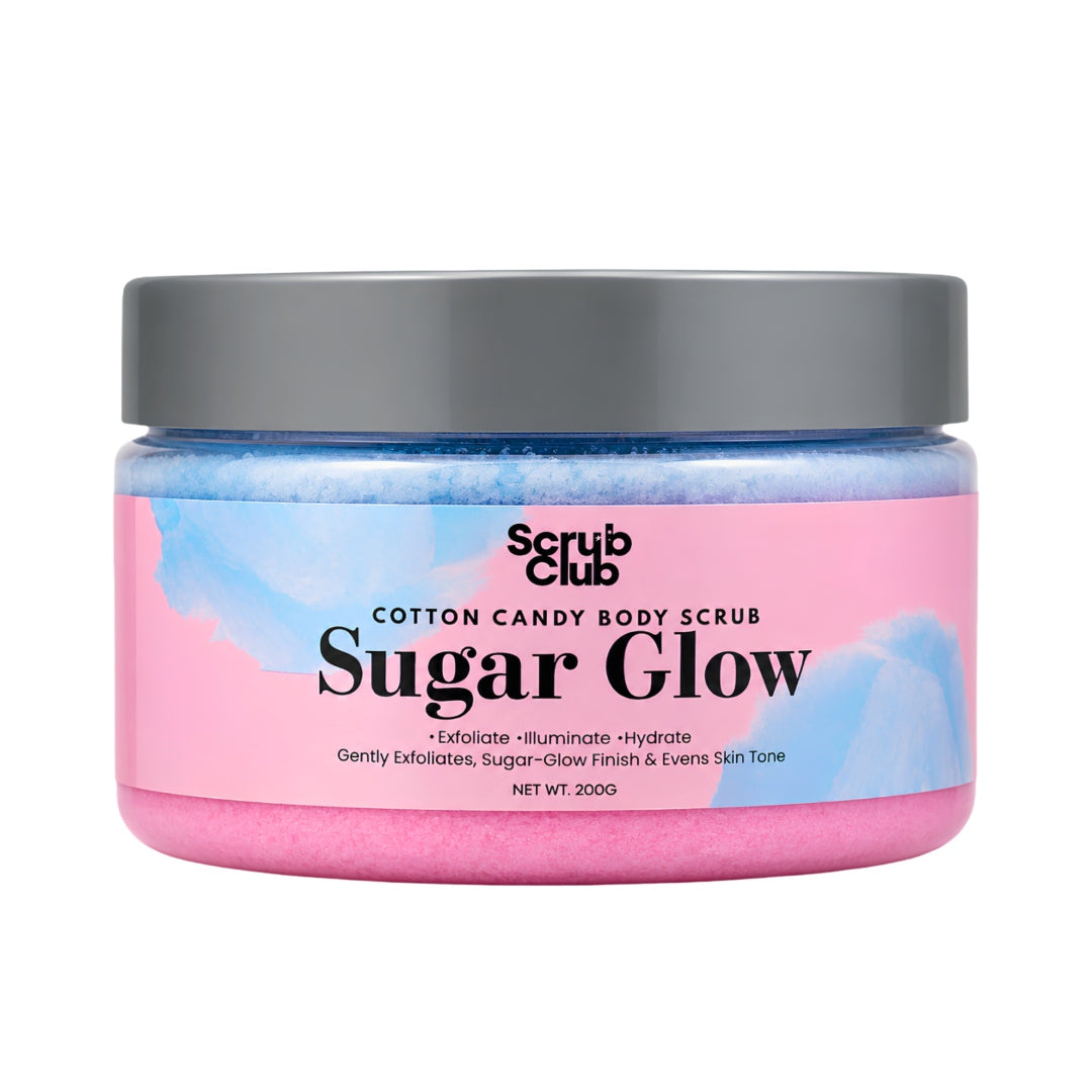 A jar of Scrub Club Sugar Candy Body Scrub with pink and blue marbled scrub visible through the clear container, a gray lid, and a pink label with blue watercolor accents.